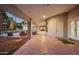 Spacious back patio with comfortable seating, perfect for enjoying the backyard with a pool at 9128 N 70Th St, Paradise Valley, AZ 85253