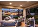 Comfortable back patio area providing outdoor seating and picturesque backyard views at 9128 N 70Th St, Paradise Valley, AZ 85253