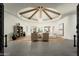 A welcoming living room featuring vaulted ceilings, natural light and neutral colors at 9128 N 70Th St, Paradise Valley, AZ 85253