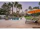 Beautiful backyard pool with rock waterfall feature and nearby gazebo and putting green at 9128 N 70Th St, Paradise Valley, AZ 85253