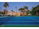 Well-maintained tennis court providing excellent recreational opportunities with palms surrounding at 9128 N 70Th St, Paradise Valley, AZ 85253