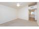 Open bedroom with ceiling fan and carpeted floor at 12224 N Gambel Dr, Fountain Hills, AZ 85268