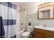 Full bathroom showcasing a shower-tub combo, a white toilet and modern fixtures at 16350 N Desert Sage St, Surprise, AZ 85378