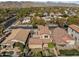 Scenic aerial view of a Southwestern home with a private pool and mountain backdrop at 20821 W Ridge Rd, Buckeye, AZ 85396