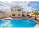 Stunning backyard with a private swimming pool and plenty of space for outdoor enjoyment at 2528 W Mericrest Way, San Tan Valley, AZ 85144