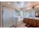 Bathroom showcasing a glass shower, large tub, and vanity with a mirror and double sinks at 2528 W Mericrest Way, San Tan Valley, AZ 85144