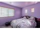 Bedroom with Paris themed bedding and small windows at 2528 W Mericrest Way, San Tan Valley, AZ 85144