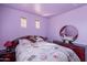 Bedroom featuring a Paris themed bedding and small windows at 2528 W Mericrest Way, San Tan Valley, AZ 85144