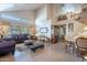 Spacious living room with high ceilings, tile flooring, and abundant natural light at 2528 W Mericrest Way, San Tan Valley, AZ 85144
