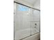 Close up of bathroom shower and tub with marble tile and glass doors at 27412 N 256Th Dr, Wittmann, AZ 85361