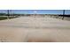 Enjoy a full outdoor basketball court with hoops and a smooth concrete surface at 36820 W San Clemente St, Maricopa, AZ 85138