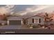 Charming single-story home with a two-car garage, desert landscaping, and a welcoming front entrance at 36820 W San Clemente St, Maricopa, AZ 85138