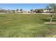 Spacious community park with green grass and walking distance to neighborhood amenities at 36820 W San Clemente St, Maricopa, AZ 85138