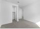 Bedroom with carpet, closet, and white walls at 37053 W La Paz St, Maricopa, AZ 85138