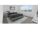 Serene bedroom featuring soft lighting, a comfortable bed, and stylish decor accents at 37053 W La Paz St, Maricopa, AZ 85138