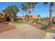 Attractive community building surrounded by palm trees and beautiful landscaping at 3777 N 162Nd Ave, Goodyear, AZ 85395