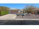 Charming home featuring a well-manicured front yard, neutral tones and a two car garage at 3777 N 162Nd Ave, Goodyear, AZ 85395