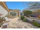 Covered outdoor patio area with table and chairs, perfect for relaxing and entertaining at 3777 N 162Nd Ave, Goodyear, AZ 85395