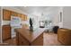 Kitchen view featuring oak cabinets, modern appliances and tile flooring at 3777 N 162Nd Ave, Goodyear, AZ 85395