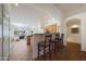 Open kitchen area with a bar, providing a convenient spot for casual dining at 3777 N 162Nd Ave, Goodyear, AZ 85395
