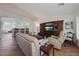 Bright living room featuring a comfortable seating area and a view into the kitchen at 3777 N 162Nd Ave, Goodyear, AZ 85395