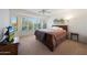 Comfortable main bedroom with large windows and a cozy ambiance at 3777 N 162Nd Ave, Goodyear, AZ 85395