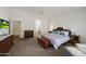 Bright main bedroom with view to the en suite bathroom at 3777 N 162Nd Ave, Goodyear, AZ 85395