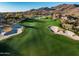 Stunning aerial view of golf course featuring manicured greens, sand traps, and desert landscaping at 41908 N La Cantera Dr, Anthem, AZ 85086