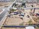 Overhead view of a property with a horse arena and a charming home at 4302 W Dobbins Rd, Laveen, AZ 85339