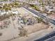 This aerial view of this lot of land shows the long road off to the side at 4302 W Dobbins Rd, Laveen, AZ 85339