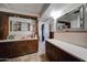 Functional bathroom featuring a mirror, sink, and vanity, offering storage solutions at 4302 W Dobbins Rd, Laveen, AZ 85339