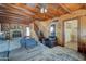 Open concept living room with wood floors, fireplace, and staircase to upper level at 4302 W Dobbins Rd, Laveen, AZ 85339