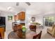 Open-concept living area featuring a kitchen with modern appliances, a dining table, and a comfortable seating area at 5877 N Granite Reef Rd # 2203, Scottsdale, AZ 85250