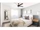 Serene bedroom featuring neutral tones, a comfortable queen-sized bed, and stylish decor accents at 6621 E Sharon Dr, Scottsdale, AZ 85254