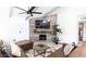 Comfortable living room showcasing a statement wall, modern fireplace, and comfortable leather seating at 6621 E Sharon Dr, Scottsdale, AZ 85254