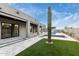 Backyard patio featuring a geometric walkway and outdoor pool at 7070 E Lowden Dr, Scottsdale, AZ 85266