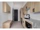 Pantry with custom cabinets and drawers, marble countertop and subway tile backsplash at 7070 E Lowden Dr, Scottsdale, AZ 85266