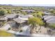 Aerial view of a beautiful home with desert landscaping and circular driveway at 7321 E Crimson Sky Trl, Scottsdale, AZ 85266