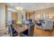 Bright dining area featuring wood floors and easy access to the entryway at 7321 E Crimson Sky Trl, Scottsdale, AZ 85266