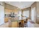 Well-equipped kitchen boasting a central island, modern appliances, and a breakfast nook at 7321 E Crimson Sky Trl, Scottsdale, AZ 85266