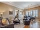 Comfortable living area with hardwood floors, neutral walls, and great natural light at 7321 E Crimson Sky Trl, Scottsdale, AZ 85266