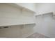 A walk-in closet with multiple racks for optimal storage at 7321 E Crimson Sky Trl, Scottsdale, AZ 85266