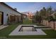 Beautiful backyard with a decorative pool, lush greenery, and a relaxing ambiance at 7508 E Laredo Ln, Scottsdale, AZ 85250