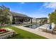 Inviting backyard with a pool, lounge chairs, outdoor seating, and manicured landscaping at 7508 E Laredo Ln, Scottsdale, AZ 85250