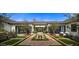 Stunning backyard with fountain, brick-laid patio, and outdoor seating area at 7508 E Laredo Ln, Scottsdale, AZ 85250