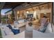 Open outdoor space featuring a seating area that adjoins a living and dining area at 7508 E Laredo Ln, Scottsdale, AZ 85250