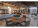 Inviting outdoor living and kitchen area that opens to a spacious living room at 7508 E Laredo Ln, Scottsdale, AZ 85250