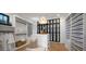 A well-organized closet with ample shelving, drawers, and decorative lighting, creating a stylish and functional storage space at 7508 E Laredo Ln, Scottsdale, AZ 85250