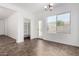 Bright dining area with tile flooring, a pantry, and a glass door leading to the outside at 7739 E Butte St, Mesa, AZ 85207