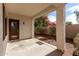 Covered patio area with access to the backyard, perfect for outdoor dining and entertaining at 7739 E Butte St, Mesa, AZ 85207